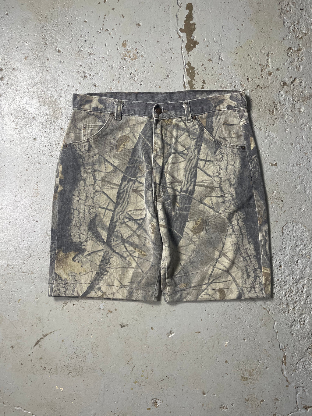 90s FADED CAMO JORTS