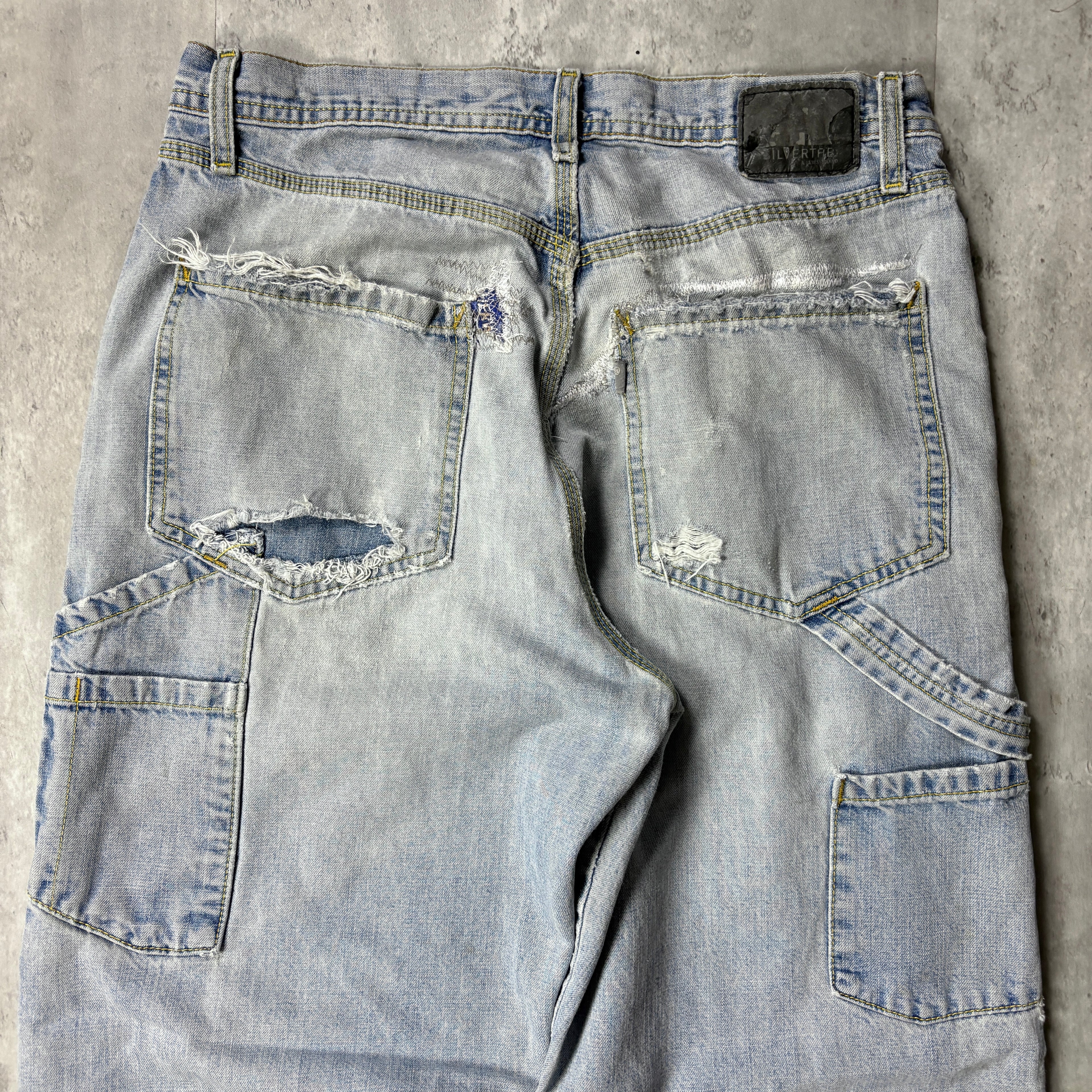 DISTRESSED LEVI'S SILVER TAB CARPENTER JEANS