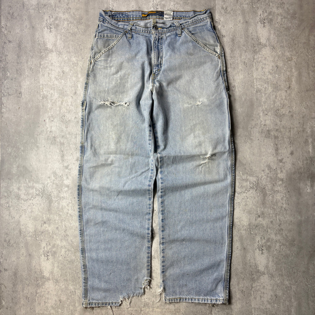 DISTRESSED LEVI'S SILVER TAB CARPENTER JEANS
