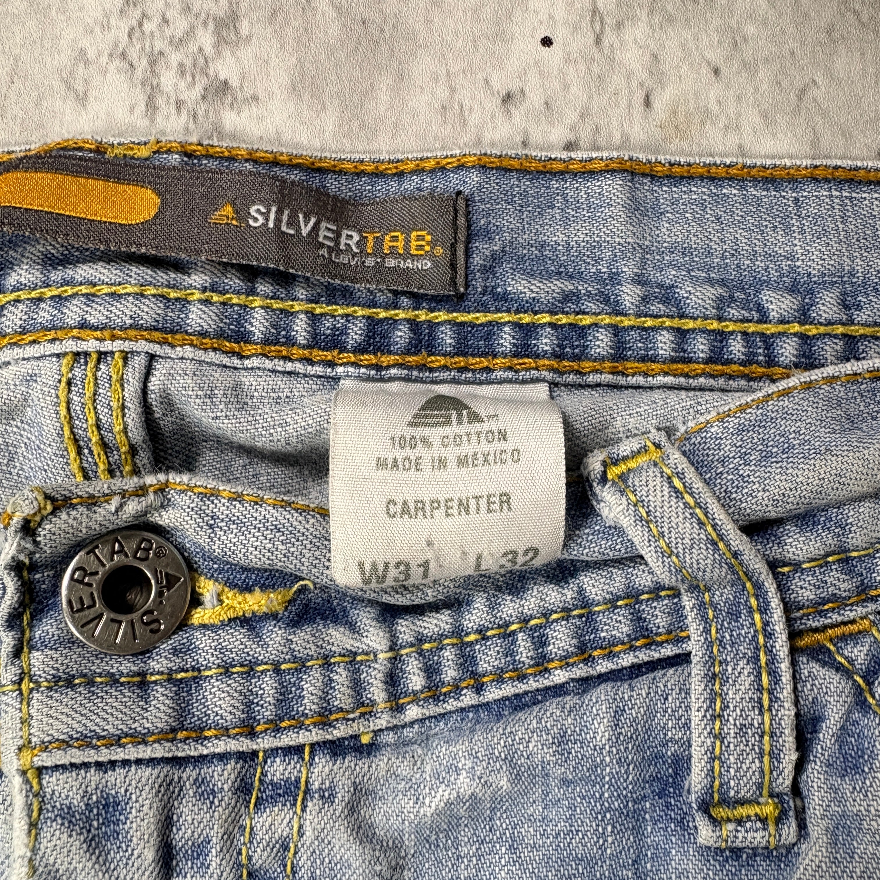 DISTRESSED LEVI'S SILVER TAB CARPENTER JEANS